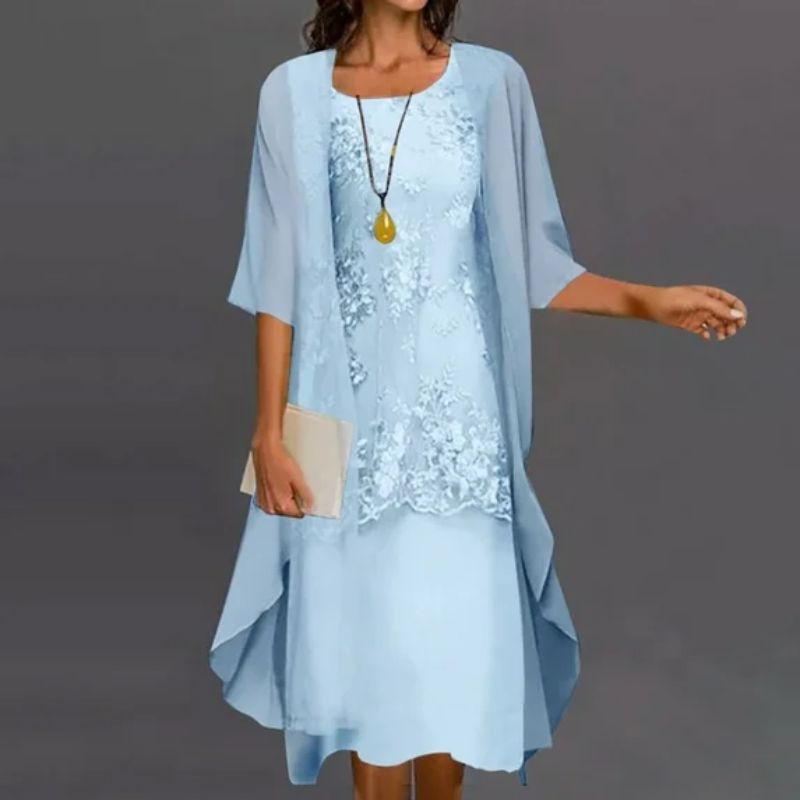 Elegantes Damen Midikleid Relaxed Fit mit Cape und feiner Spitzen-Optik, ideal für festliche Anlässe.