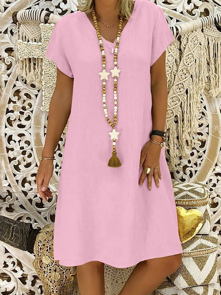 Kurzarm Damen Sommerkleid in eleganter A-Linie. Minikleid mit V-Ausschnitt für Freizeit & Komfort.