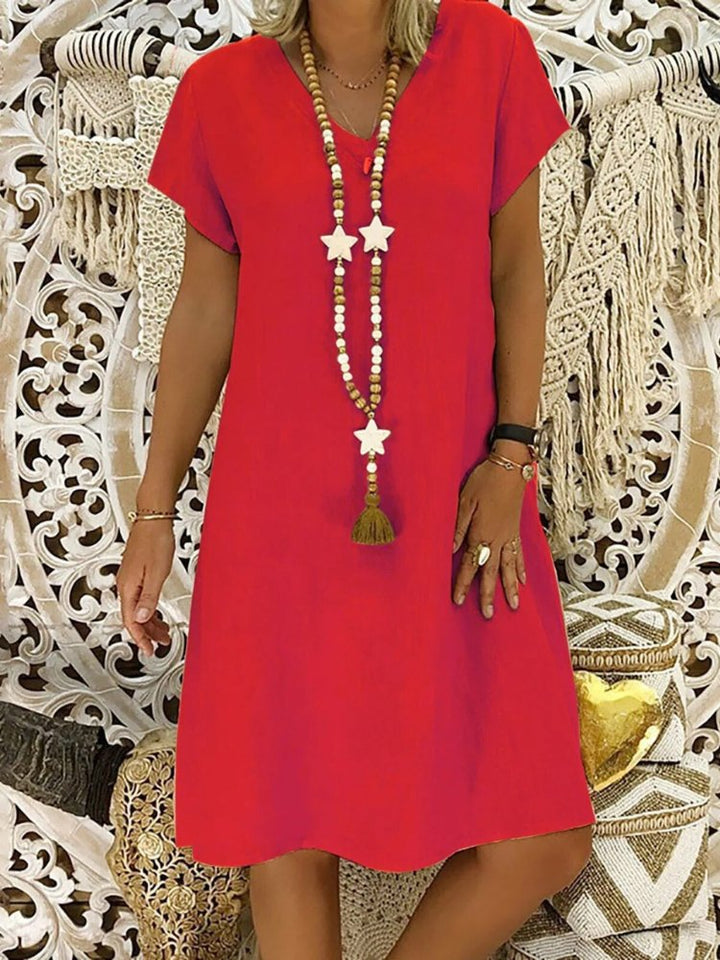 Elegantes Damenkleid: sommerliches Minikleid mit V-Ausschnitt & A-Linie. Kurzarm für stilvolle Freizeit.