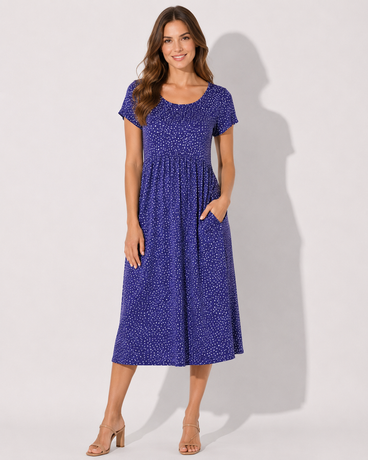 Modisches Damen Kurzarm-Midikleid mit Tupfenmuster. Elegant & bequem als Freizeit- oder Sommerkleid tragbar.