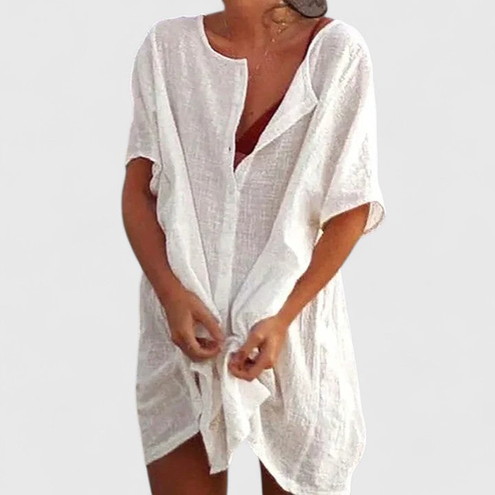 Damen Tunika-Kleid in Bewegung, fließender Stoff, elegantes Sommerkleid für entspannte Momente.