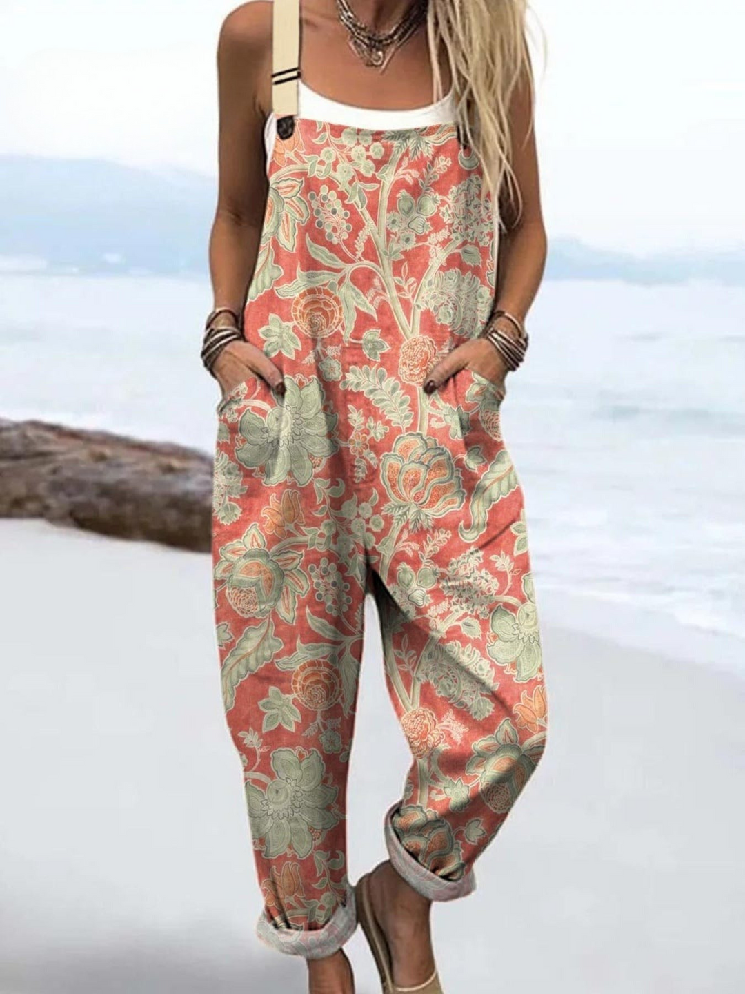 Komfortables ärmelloses Damen Wickelkleid mit stilvollem Vintage-Blumenprint und Seitentaschen für Strand oder Stadt.