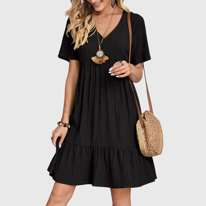 Flatterndes, elegantes Damen Midikleid im Boho-Stil. Perfektes Sommerkleid mit lockerer Passform für Freizeit.