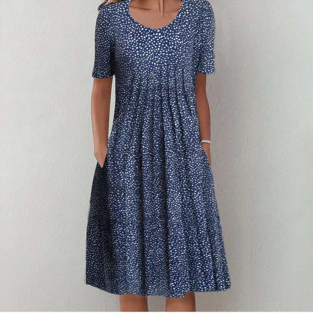 Sommerliches Damen Midikleid mit Blumenmuster, fließend. Perfekt für Hochzeiten, festliche Anlässe und Urlaub.