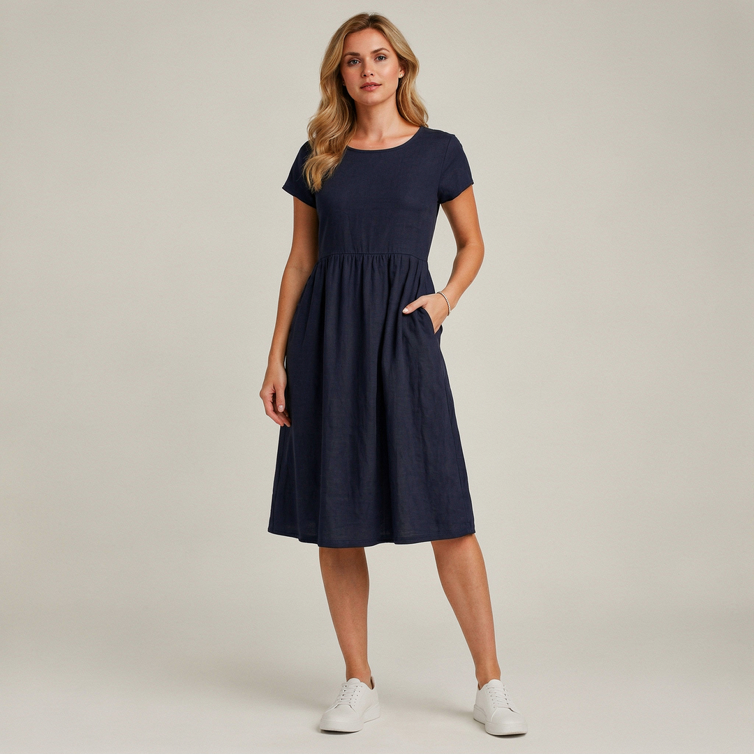 Damen Kurzarmkleid mit Rundhals und praktischen Taschen im luftigen A-Linie-Schnitt, ideal für Sommer & Alltag.