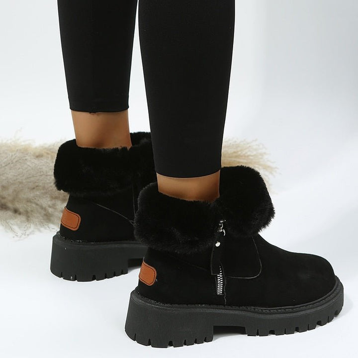 Rutschfeste Sohle der Damen Winterstiefeletten, speziell für sicheren Halt auf Eis & Schnee konzipiert.