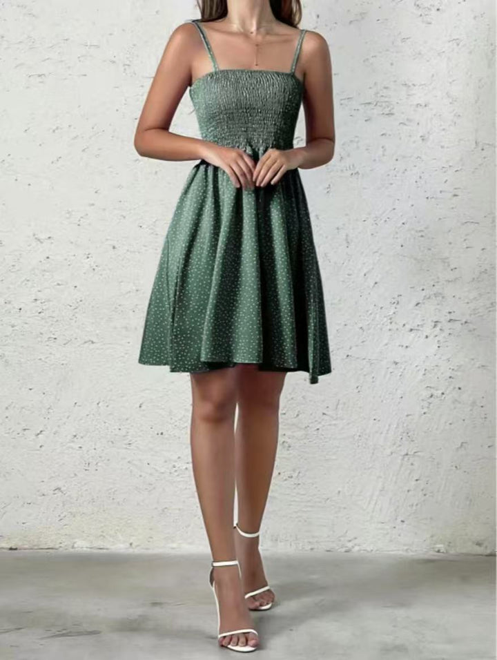 Damen Sommerkleid: Elegant, rückenfrei, gepunktet und luftig, perfekt für den Sommerurlaub.