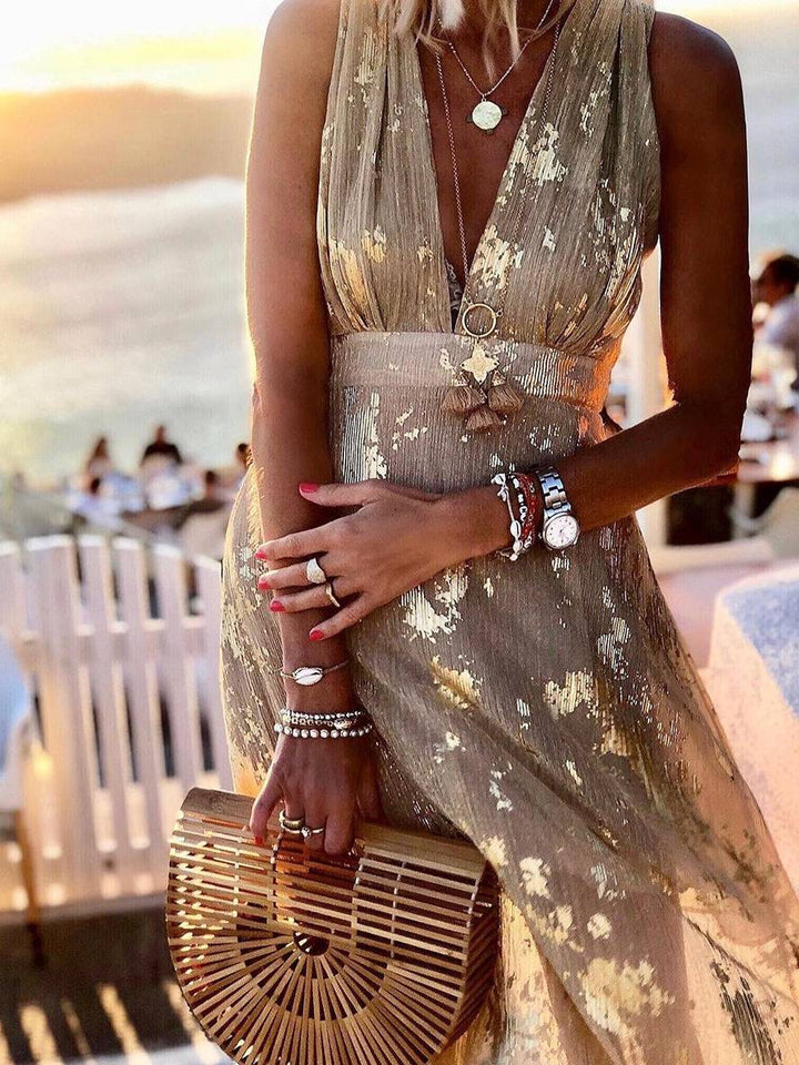 Elegantes Maxikleid mit V-Ausschnitt, ärmellos. Perfektes Damenkleid für Hochzeitsgäste.