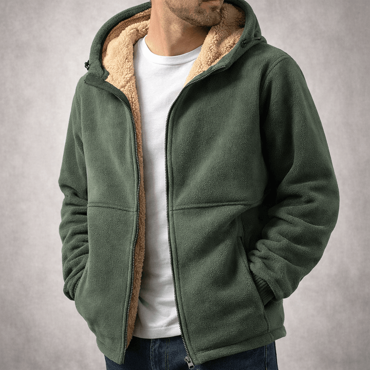 Praktische Herren Winterjacke, blau, mit Kapuze, Reißverschluss, ideal für kalte, nasse Tage.
