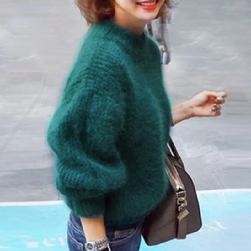 Moderner Damen Winterpullover in Strick. Stilvolles und warmes Langarm-Oberteil für trendbewusste Frauen.
