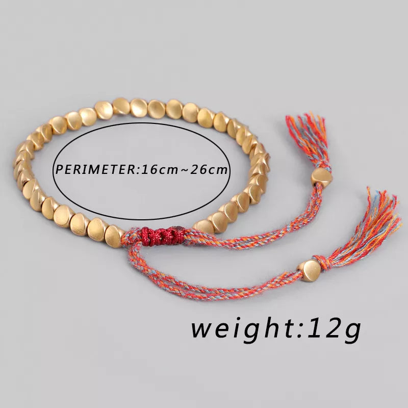 Verstellbares Unisex Seilarmband geflochten mit echten Kupferperlen, ein vielseitiges Glücksarmband für jedes Outfit.