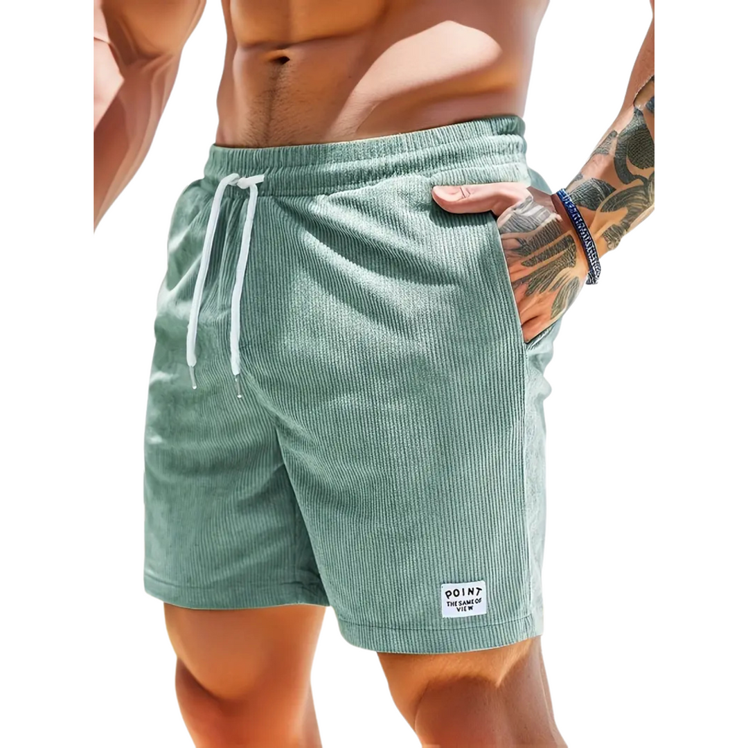 Detailansicht der Herren Badeshorts: Verstellbarer Bund und praktische Seitentaschen für Komfort.