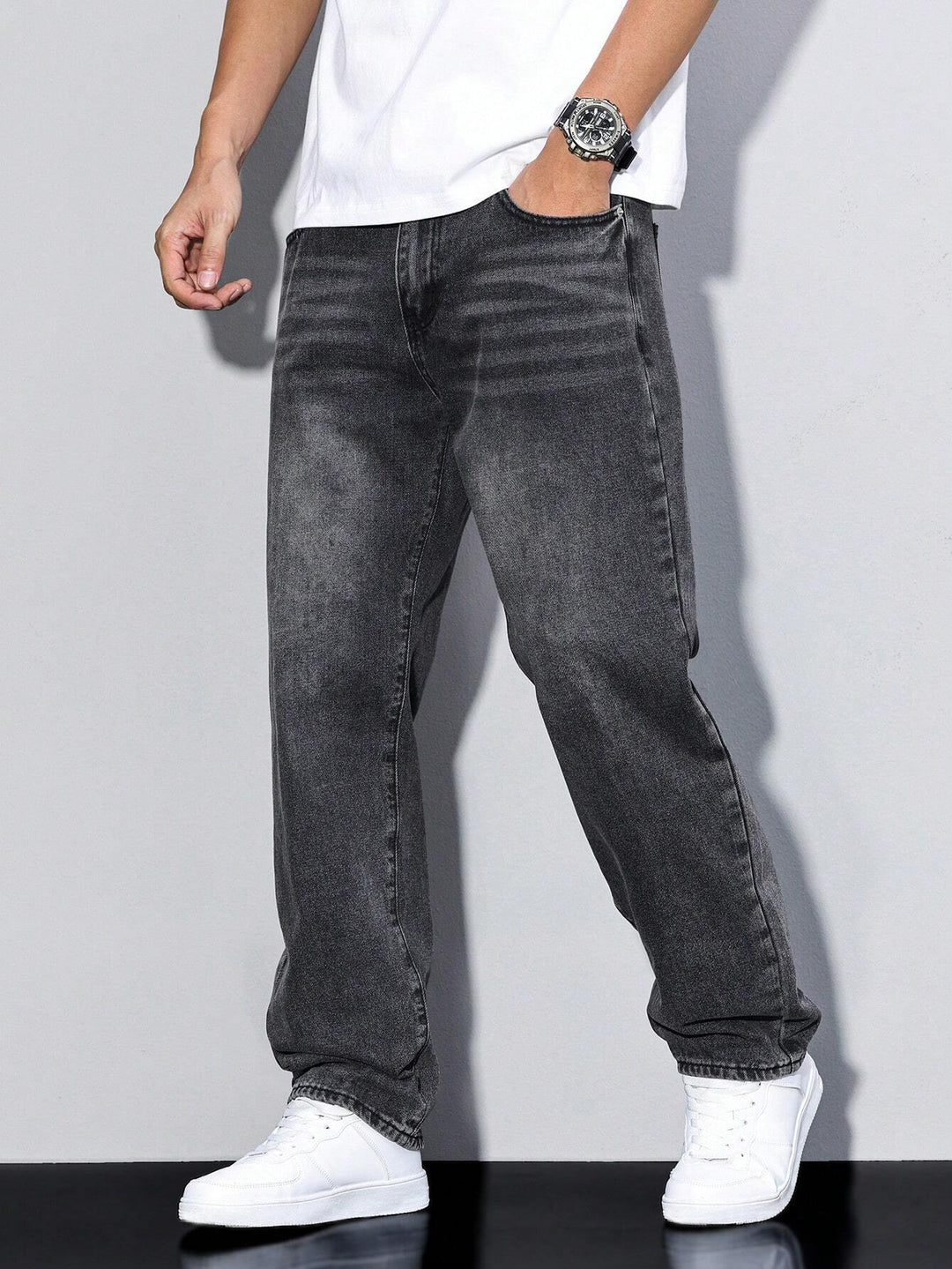 Herren Baggy Jeans in dunklem Denim, lässige Loose Fit Hose für Herbst/Winter.