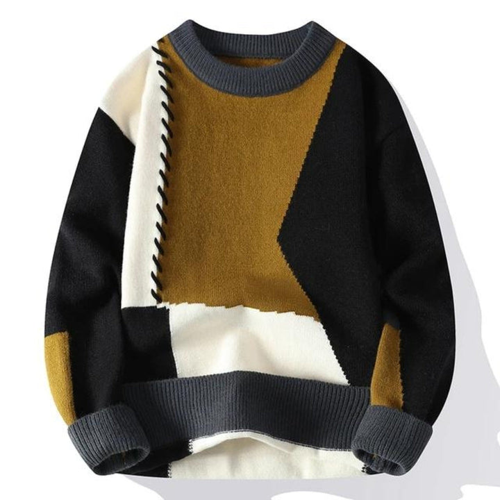 Künstlerischer Herren Patchwork-Pullover, ein modernes Oberteil für individuelle Herrenmode und entspannte Outfits.