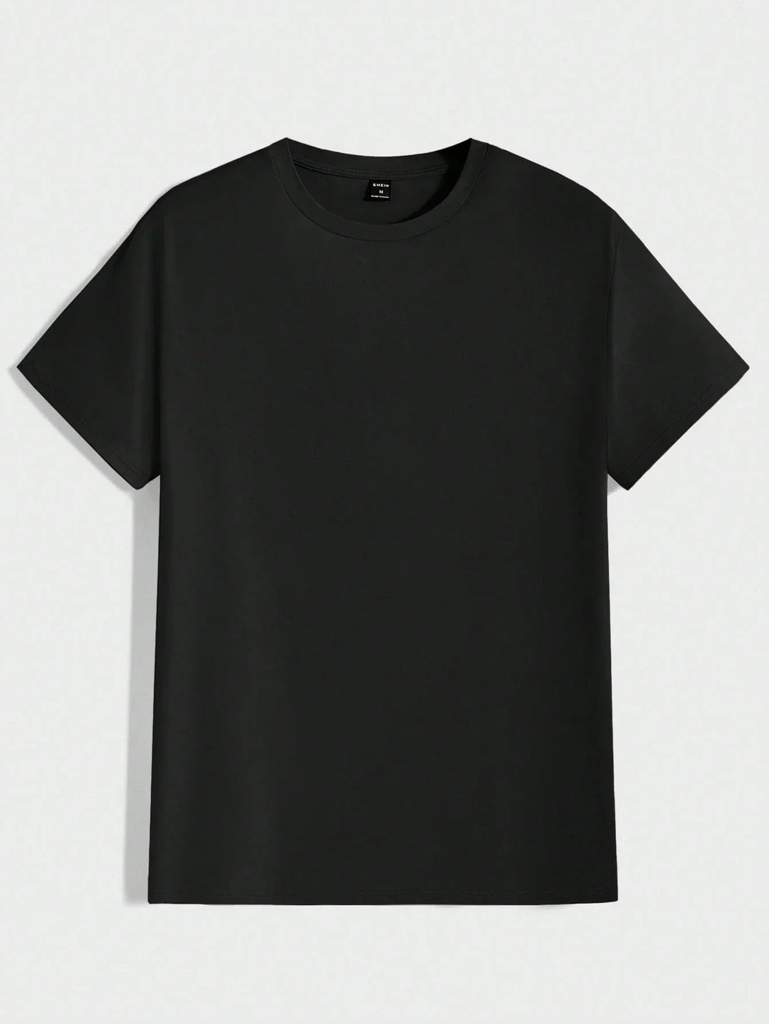 Detailaufnahme: Feine Struktur des Herren Rundhals T-Shirts, weicher Stoff.
