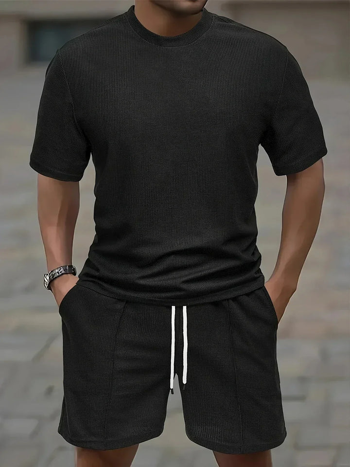 Herren Sportanzug zweiteilig: Lässiges Kurzarm-Shirt und Shorts Set für Sommer-Freizeit.