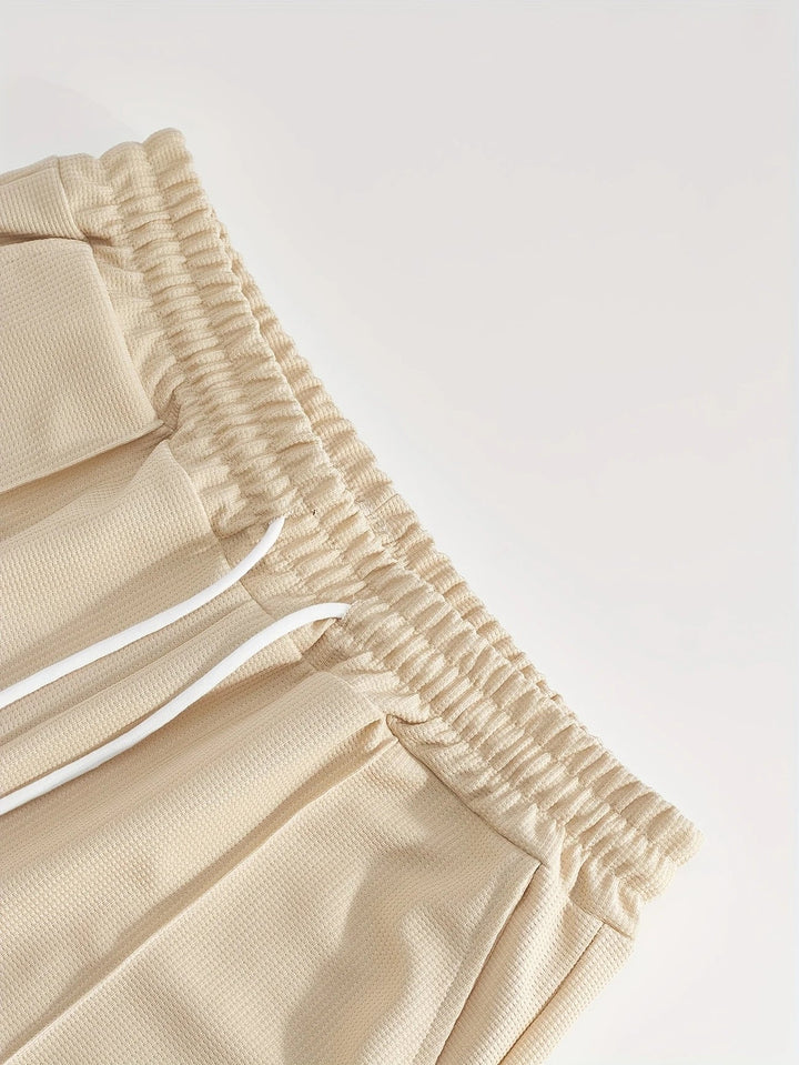 Lässiger Herren Jogginganzug: Kurzarm und Shorts Set, optimal für den Sommer.