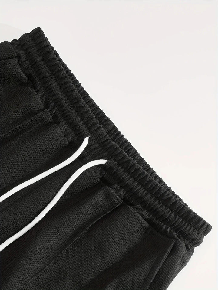 Herren Zweiteiler: Lässiger Sommer-Jogginganzug, perfekt für Sport und Freizeit.