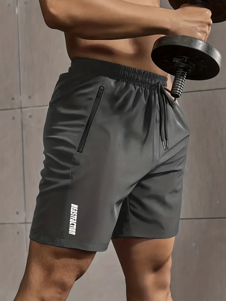 Perfekte Herren Fitnessshorts für intensives Training mit sicheren Reißverschlusstaschen.