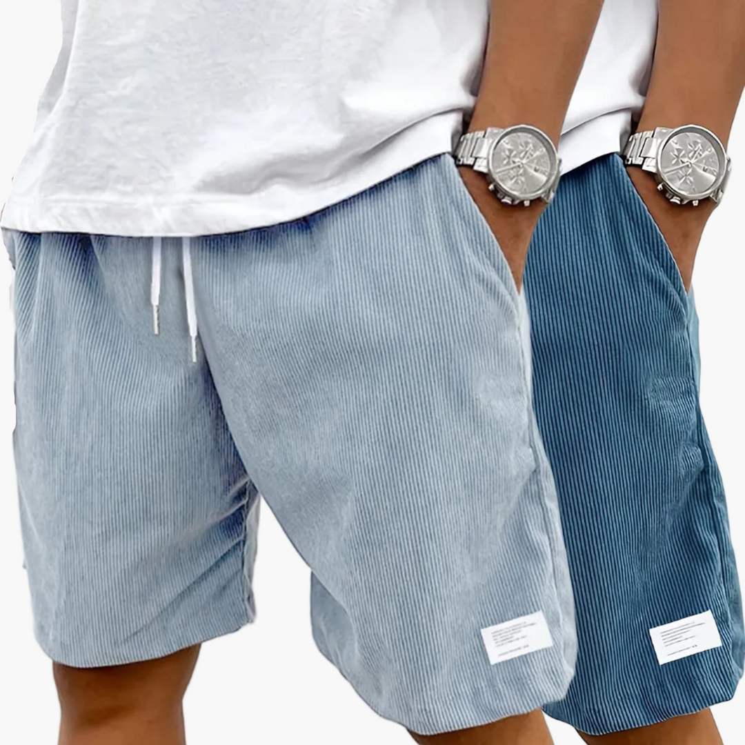Mann in Bewegung mit lässigen Herren Streetwear Shorts, atmungsaktiv und komfortabel.