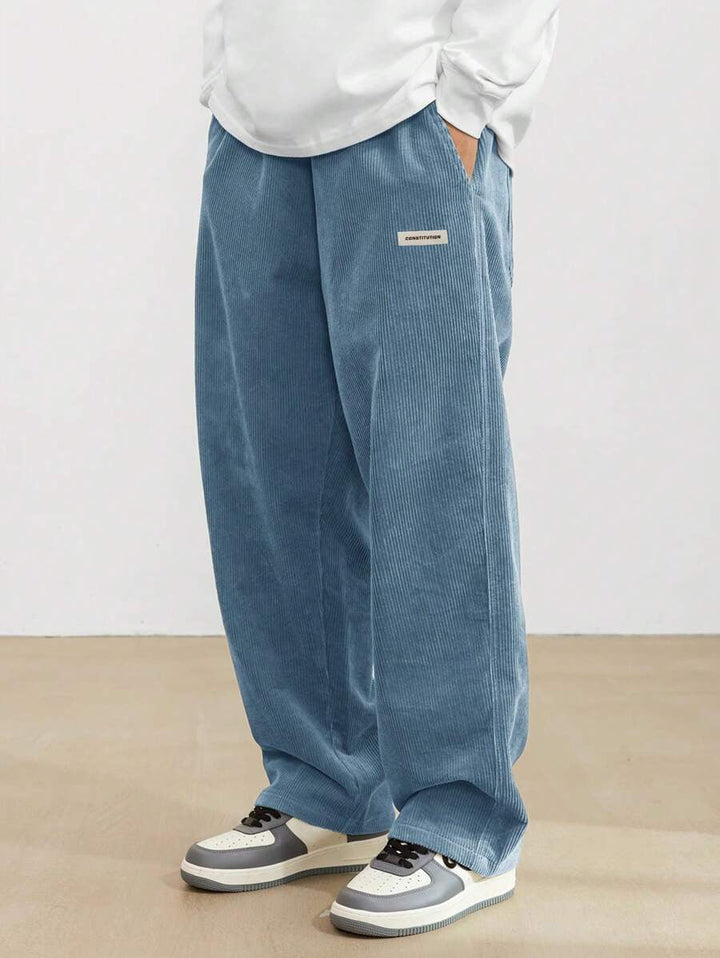 Stilvolle Herrenhose mit Kordelzug, weites Bein, lockerer Schnitt, moderne Herbst/Winter Streetwear.