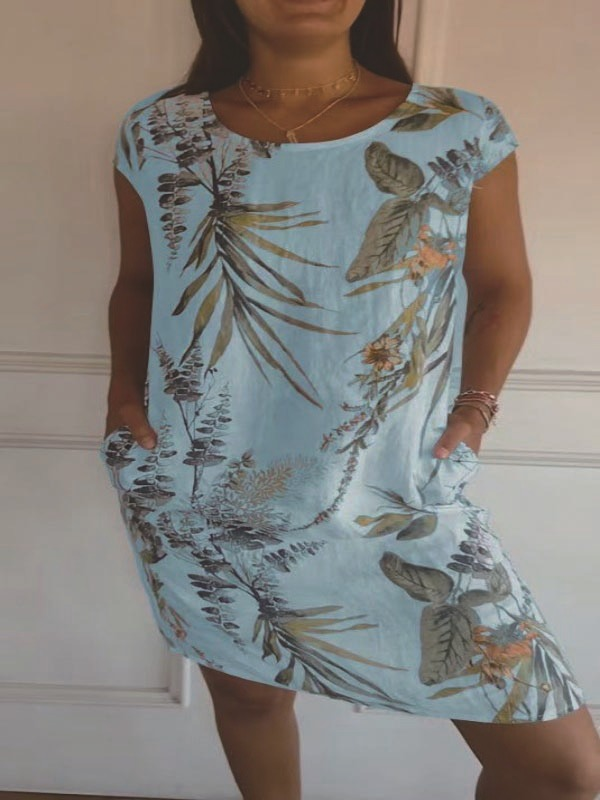 Komfortables Damen-Sommerkleid mit Rundhals, floralem Muster und Taschen, perfekt für Freizeit & Urlaub.