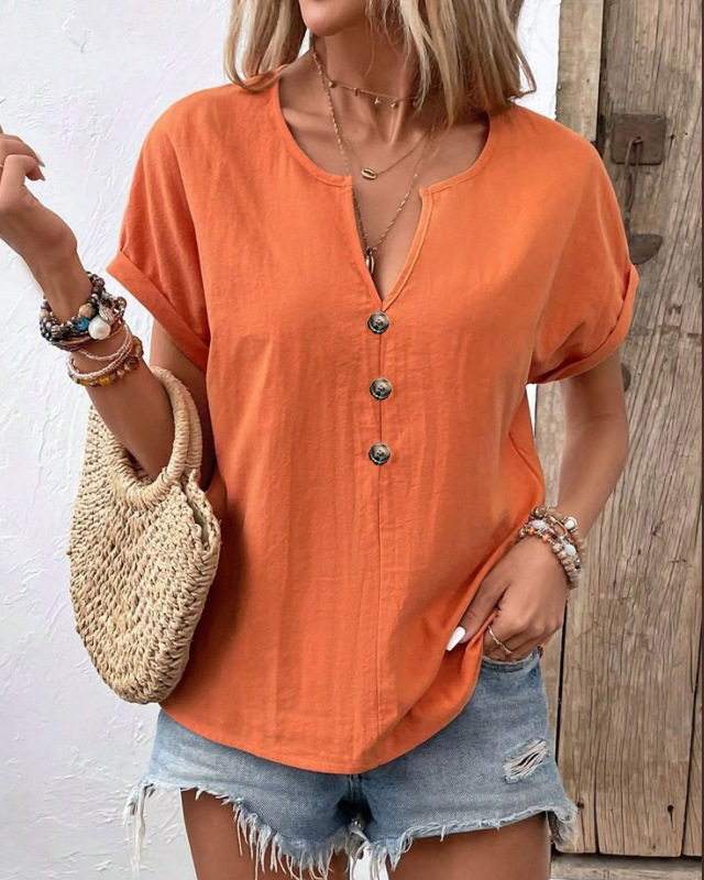 Elegantes Damen Kurzarm T-Shirt in Aprikose mit einzigartigem Twist-Detail, ideal für lässige Sommerlooks.