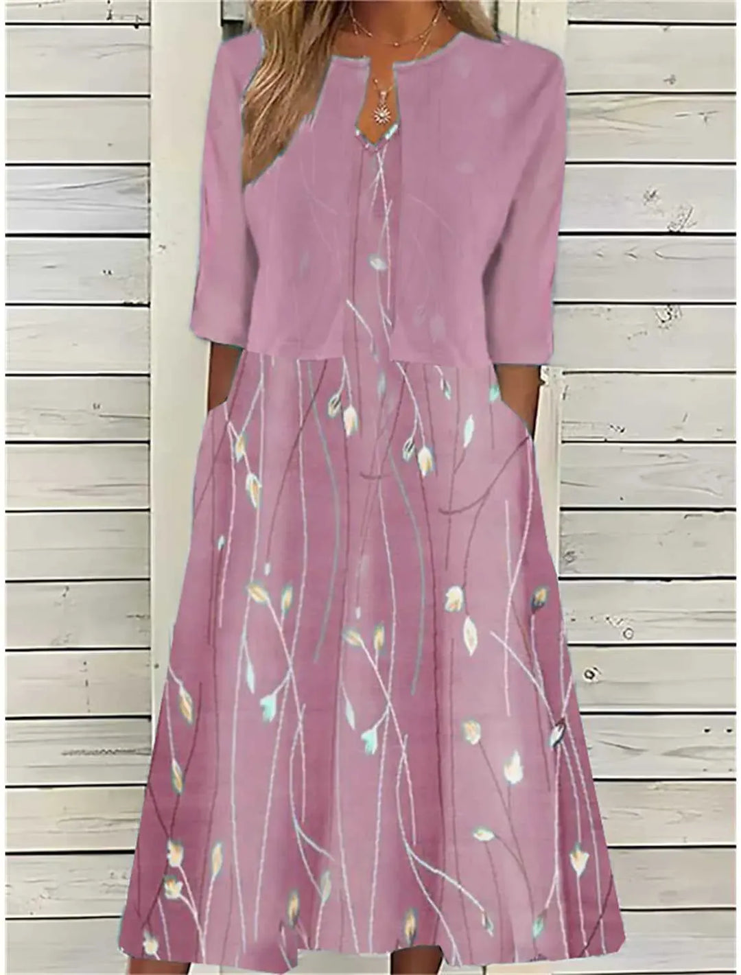 Feminines Damen Midi Freizeitkleid mit V-Ausschnitt, praktischen Taschen und Blumenmuster, perfekt als Sommerkleid.