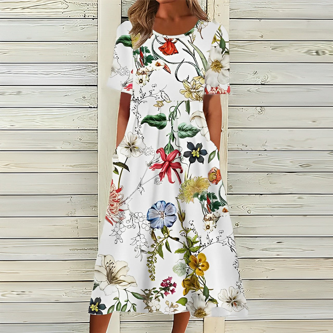 Elegantes Damen Midikleid mit sommerlichem Blumenmuster und Kurzarm, ideal für Freizeit und festliche Anlässe.