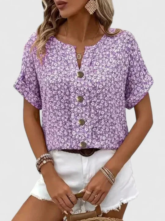 Lockere Sommerbluse für Damen mit elegantem Blumenmuster, bequemes Oberteil in trendiger Damenmode.