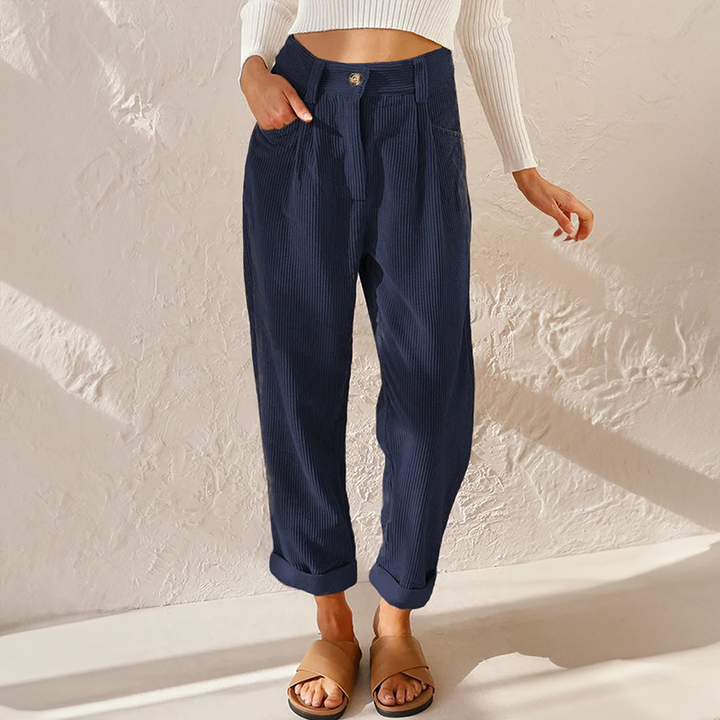 Komfortable Relaxed-Fit Damenhose mit hohem Bund und weiten Beinen aus fließendem Stoff. Elegant & bequem.