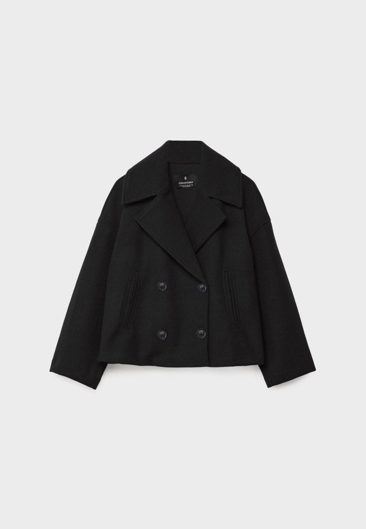 Klassische kurze Damenjacke für einen stilvollen Übergang zwischen Frühling und Herbst.