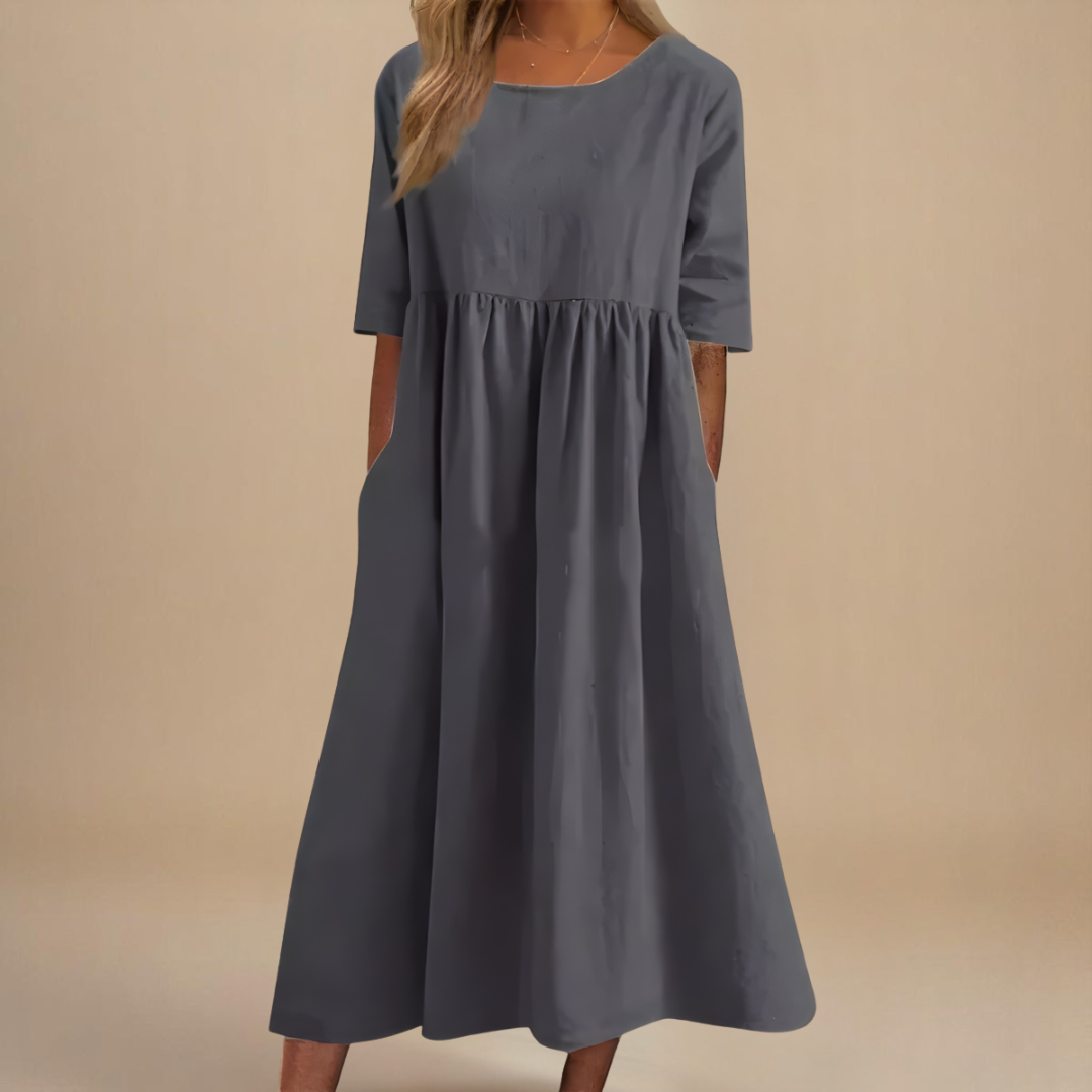 Damen Sommer Midikleid im Relaxed Fit mit Taschen, perfekt für Bewegung; stilvolles, bequemes Urlaubs-Freizeitkleid.