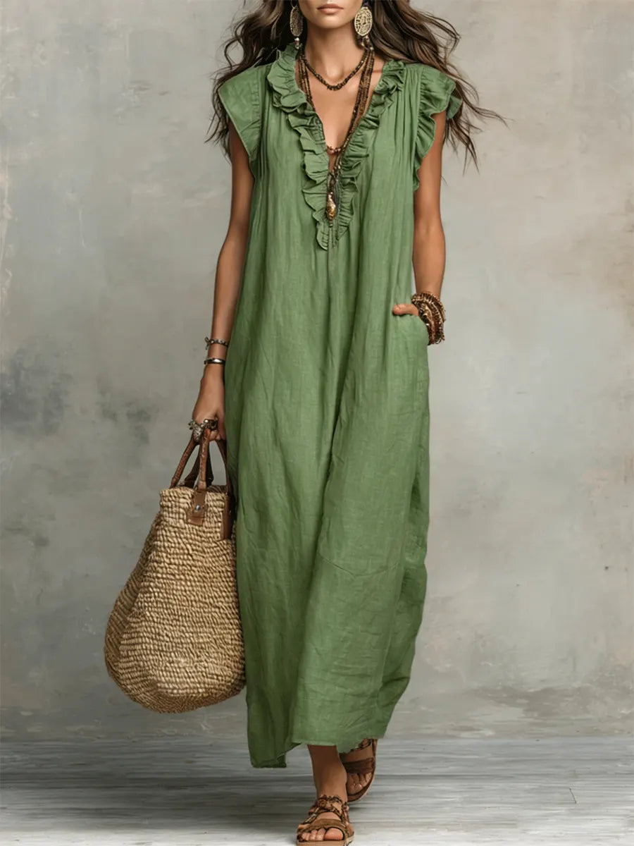 Elegantes Boho Damen Maxikleid mit V-Ausschnitt. Langes, ärmelloses Sommerkleid für entspannte Freizeitlooks.