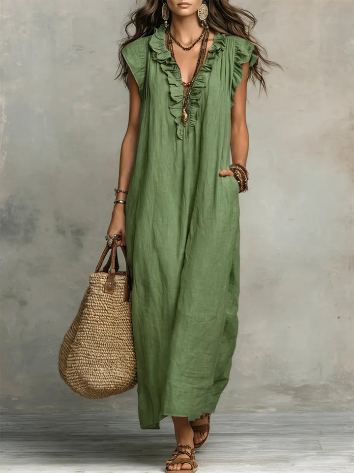 Elegantes Boho Damen Maxikleid mit V-Ausschnitt. Langes, ärmelloses Sommerkleid für entspannte Freizeitlooks.