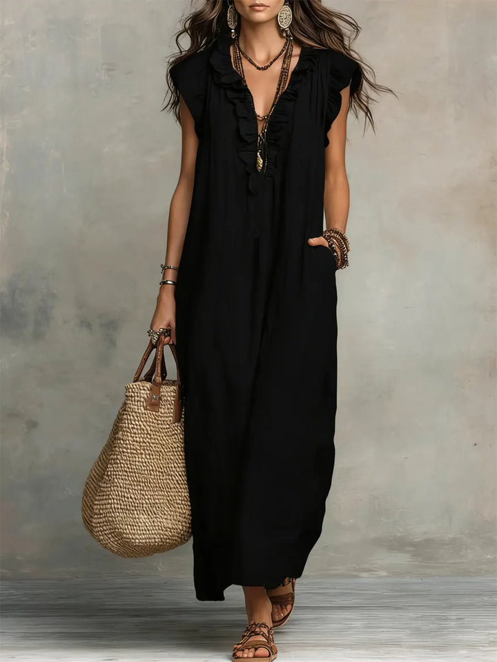 Ärmelloses Damen Maxikleid mit V-Ausschnitt. Langes, lässiges Sommerkleid, ideal als bequemes Freizeitkleid.