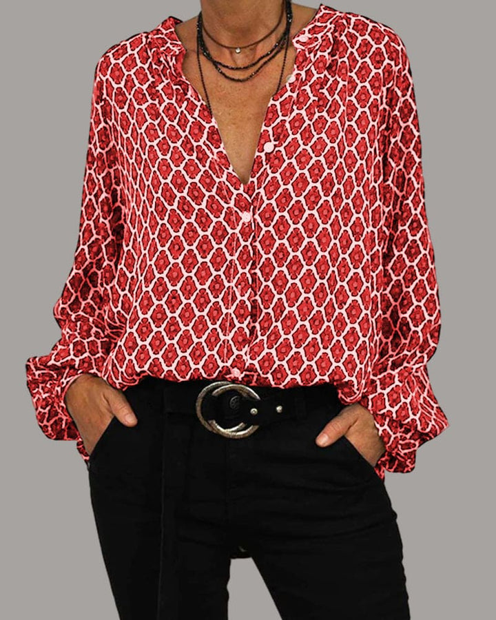 Bequeme Damenbluse mit auffälligem geometrischem Muster und elegantem V-Ausschnitt für jede Gelegenheit.
