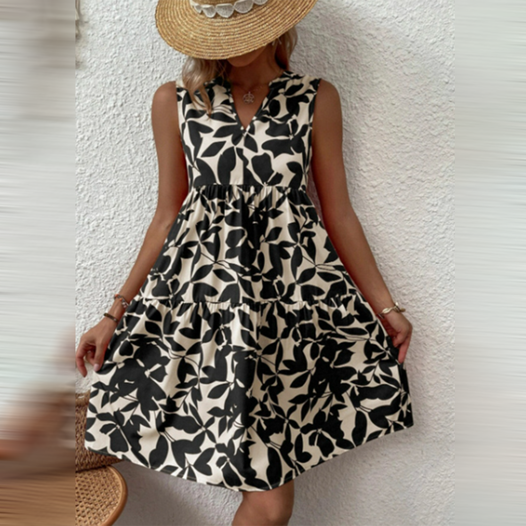 Elegantes Damen Sommer Minikleid mit Blumenmuster & V-Ausschnitt, ideal als Hochzeitsgast-Outfit.