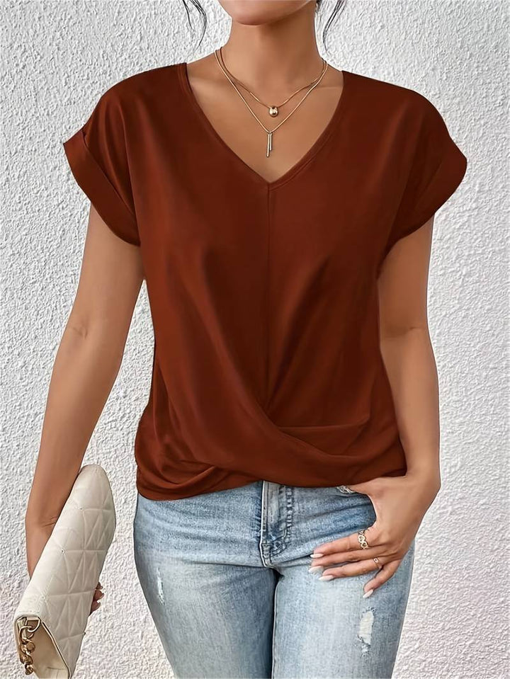 Modisches Damen Sommer Top, leicht & luftig, mit V-Ausschnitt und stylischer Verdrehung für Freizeitlooks.