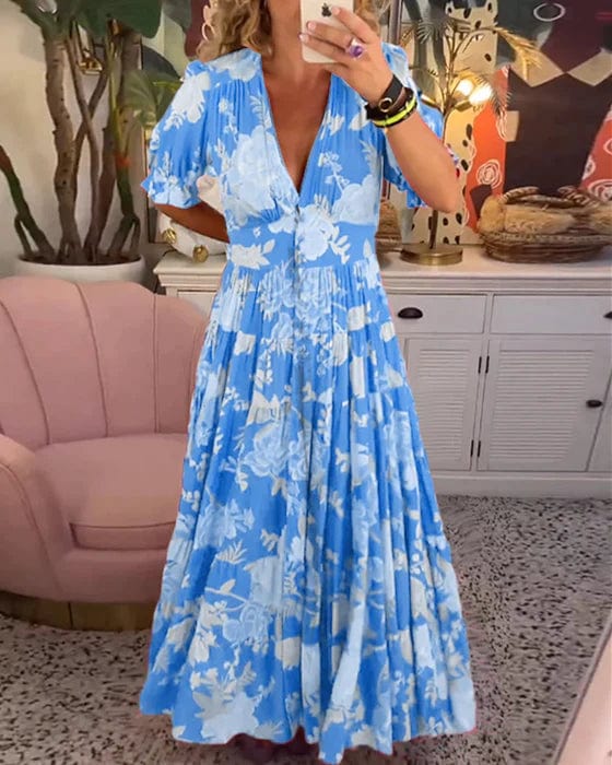 Elegantes Damen Blumenkleid, knöchellang, mit femininem V-Ausschnitt und fließendem Stufenrock. Perfekt für den Sommer.
