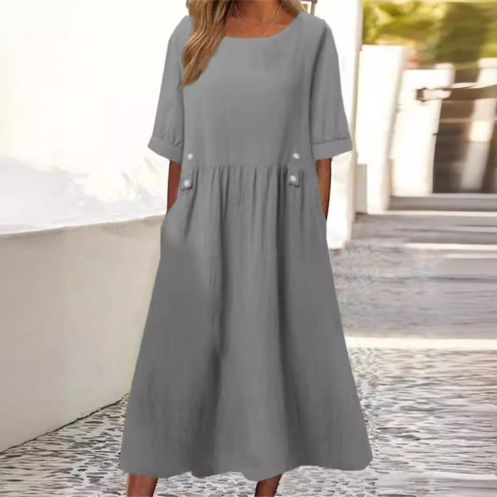 Bequemes Damen Midikleid in Weiß, Grün, Grau oder Lila. Lockeres Freizeitkleid mit Rundhalsausschnitt, atmungsaktiv.