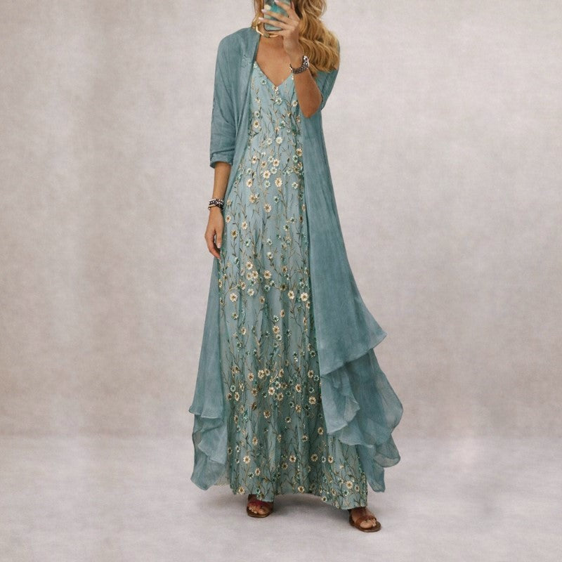 Luftiges Damen Maxikleid mit elegantem Blumenmuster, V-Ausschnitt und ärmellos. Ideales Sommerkleid in Maxilänge.