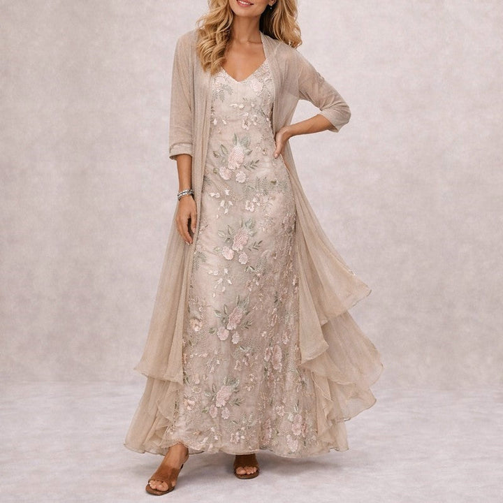 Beiges Damen Maxikleid mit Blumenmuster. Elegantes, ärmelloses Sommerkleid mit V-Ausschnitt für jede Gelegenheit.