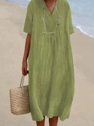 Elegantes Damen Sommerkleid, midi-lang, mit V-Ausschnitt & kurzen Ärmeln. Ideal für Urlaub & warme Tage.