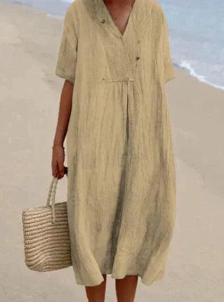 Farbenfrohes Damen Sommerkleid, midi-lang, mit V-Ausschnitt & kurzen Ärmeln. Bequem & elegant für den Sommer.