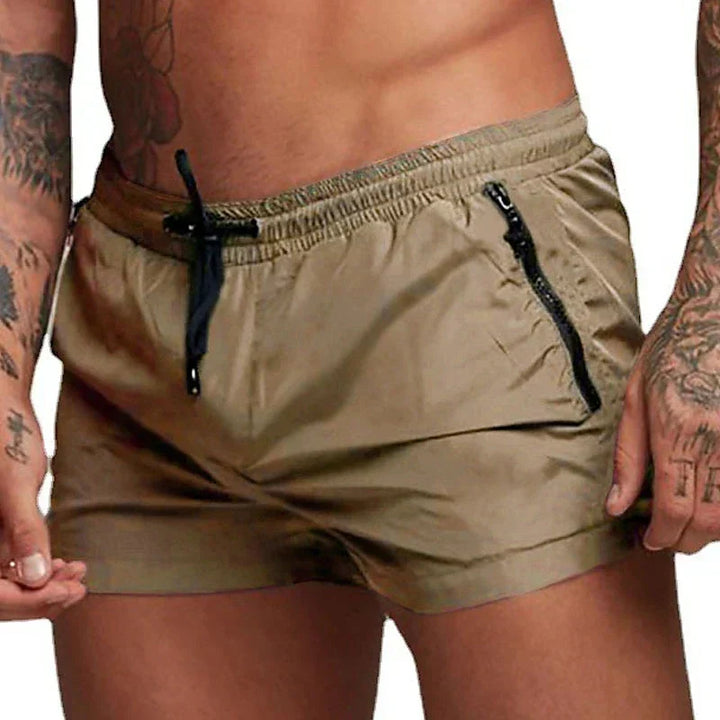 Struktur des schnelltrocknenden Stoffs der Herren Badeshorts, perfekt für heiße Sommertage.