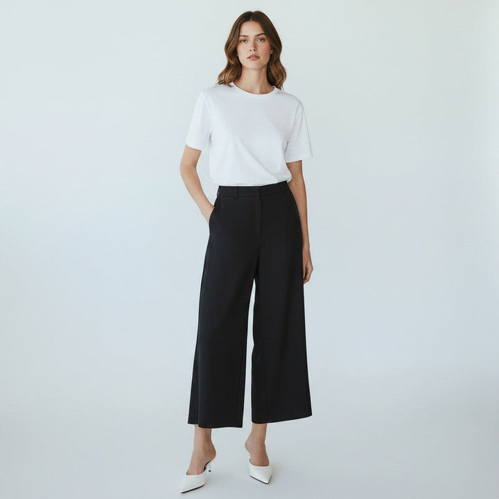 Stilvolle Damen Pumps-Pantoletten mit Absatz und spitzer Kappe für Abend- und Business-Anlässe.