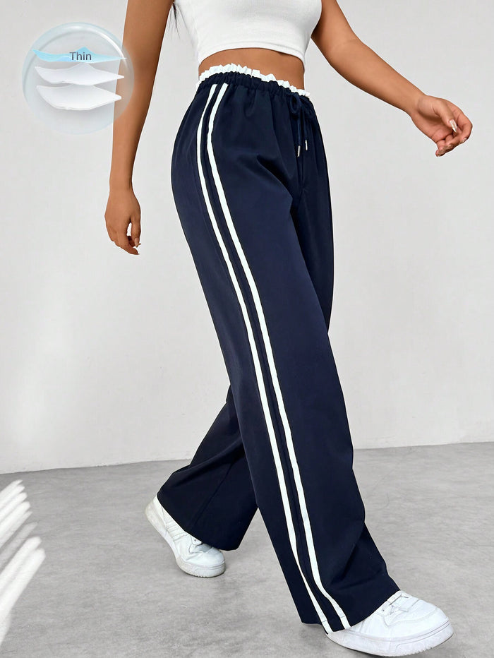 Bequeme Damen High Waist Jogginghose mit Seitenstreifen, perfekt für Sport, Alltag & Freizeit.