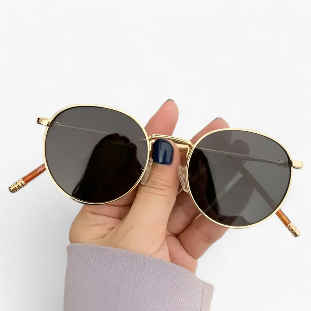 Trendige runde Unisex Sonnenbrille für Damen und Herren; bietet stilvollen UV-Schutz für alle Outdoor-Aktivitäten.