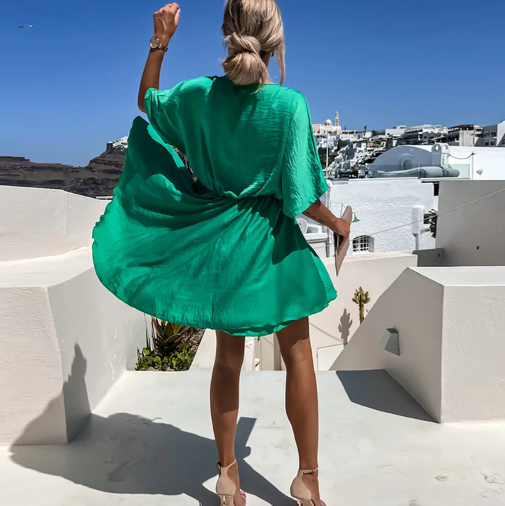 Rosa Damen Kurzarm Wickel Midikleid, figurbetont und bequem, perfekt für elegante Sommerlooks.